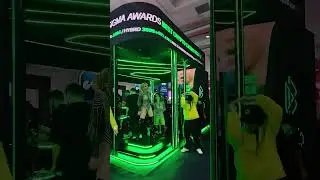 Neon Green Model Dancing Sigma Summit 2024