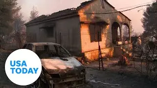 Residents in Greece return to damaged properties after wildfire | USA TODAY