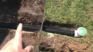 Installing a downspout drain