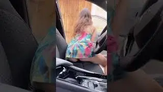 hot brunette in minidress showing tiny ass in an incredible upskirt in her car