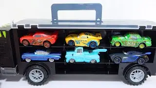 12 type Disney Cars Tomica. mcqueen & black truck