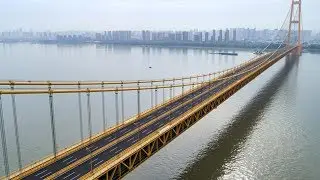 Worlds longest double-deck suspension bridge opens to traffic