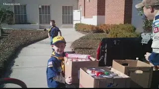 Cub Scouts collecting food donations for Forsyth community