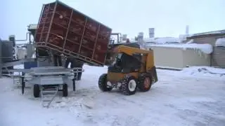 Погрузка контейнера в бройлеровоз Meusburger Новтрак