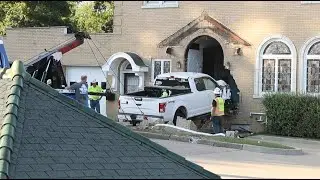 Truck removed after crashing into Collinsville, Illinois funeral home