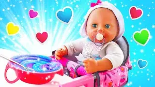 Baby Annabell doll goes for a walk! Carrier for the Baby Born doll & a feeding table. Baby Videos.