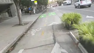 Biking in Seattle down 2nd Ave in the protected two-way bike lane