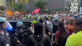 Anti-Israel protesters clash with police outside Chicago’s Israeli consulate during DNC