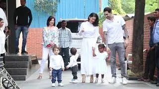 Sunny Leone with her kids outside thier play school