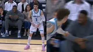 LaMelo Ball hits 3 and points at Thanasis for talking trash while courtside 😂