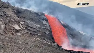 Italy: Stunning images capture sizzling hot lava flowing from Mount Etna