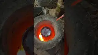 Stirring Molten Aluminum