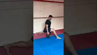 Weighted stretch for higher martial arts kicks #karate #martialarts #kicks #stretching #strength