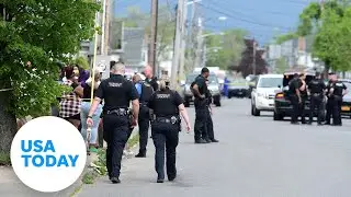 Mass shooting at Buffalo supermarket leaves at least 10 dead in racially motivated attack