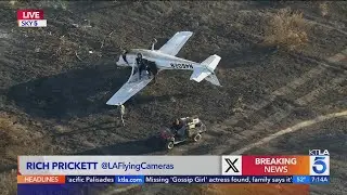 Small plane crashes in field next to 405 Fwy in Van Nuys