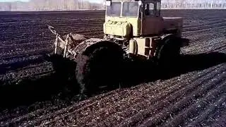 Tractor K 700 working in field