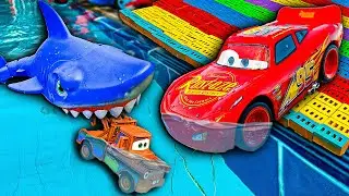 Disney Pixar Cars falling into deep pool, Lightning McQueen, Tow Mater, Mack, Sally, Francesco