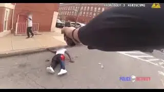 В США негр с ножом повалил девушку на землю, но тут вмешался полицейский и всадил всю обойму в негра