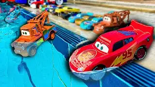 Disney Pixar Cars falling into deep pool, Lightning McQueen, Tow Mater, Mack, Sally, Francesco