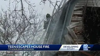 Milwaukee crews battle two-alarm house fire