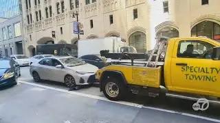 Couple says tow truck tried to nab their moving car in San Francisco - EXCLUSIVE