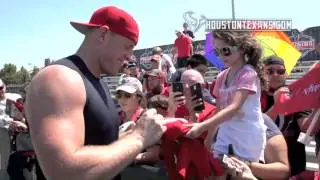 Young Texans fan hugs & kisses J.J. Watt