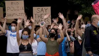 Demonstrators protest in Jamaica Plain