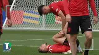 Albania PLAYER knocked down after taking a ball to the GROIN area during TRAINING session