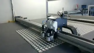 Bullmer Cutter with Fabric Pattern Matching for upholstery and fashion using Scanner Beam