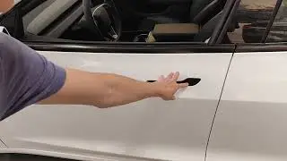 How to open door on Tesla Model 3