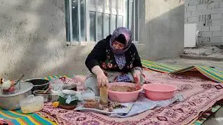 The joy of cooking Tabrizi meatballs on a wood stove in a garden house with walnut trees