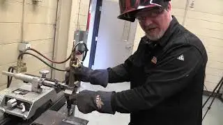 Removing the backing strip and cutting bend coupons on the line burner