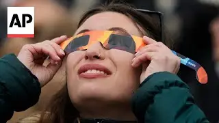 Total solar eclipse viewers react to rare celestial event