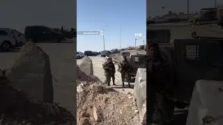 Israeli forces prevent an ambulance carrying a patient from passing through in the West Bank