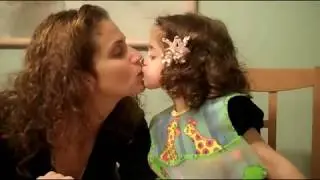 Cutest Daughter Kissing Mommy