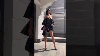 Hit skinny brunette in minidress and highheels shows long legs and cleavage