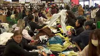 Bargain Hunters Find Discounted Designer Clothes at Bin Sale