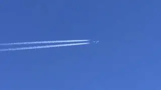 A Cruising U.S Air Force Lockheed C-5M Super Galaxy trailing overhead at 36,000 ft in clear skies