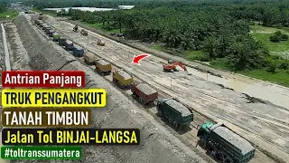 MELIHAT  ANTRIAN  PANJANG  TRUK  PENGANGKUT  TANAH  TIMBUN  JALAN  TOL  BINJAI LANGSA