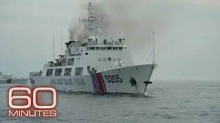 China rams Philippine ship while 60 Minutes on board; South China Sea tensions could draw U.S. in