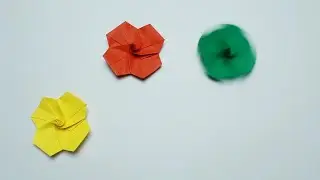 Como fazer um brinquedo de origami de papel. Girador