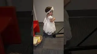 11 MONTHS OLD IN WHITE DRESS 