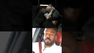 Jon Jones reacts to Tom Aspinall's wrestling