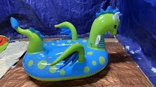 Popping The Inflatable Dragon With Knitting Needles!! Poke Pop.