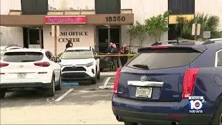 Police: 2 killed in elevator shootout at Bank of America Office Tower in Miami Gardens