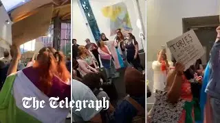 Trans activists chant Tory scum at the Education Secretary, during University of Warwick speech