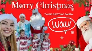 Twins meeting Santa for the 1st time!