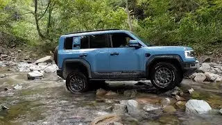 BYD FangChengBao Leopard 5 Off-Road Performance in a Rocky Stream