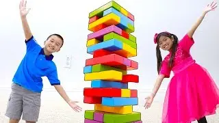 Emma & Andrew Pretend Play with Giant Colored Jenga Toy Blocks