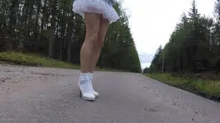 Crossdressing in ankle socks and white heels.